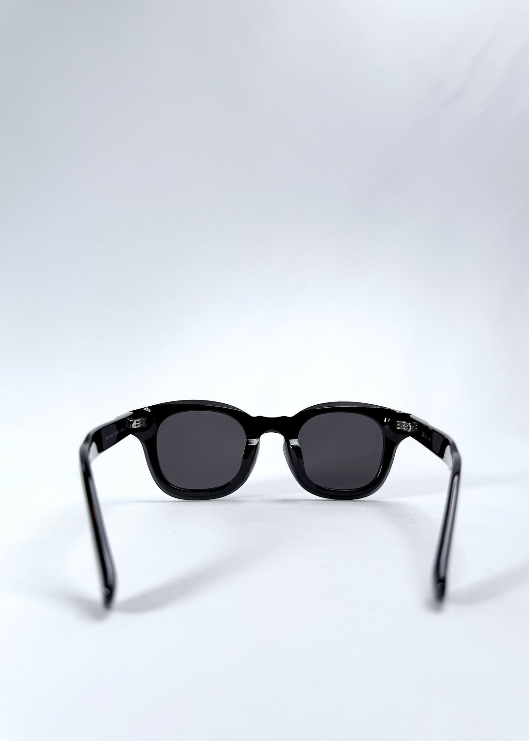 Back view of Phantom Verge in Obsidian Black, revealing the slim, comfortable arms and compact frame for petite faces. 