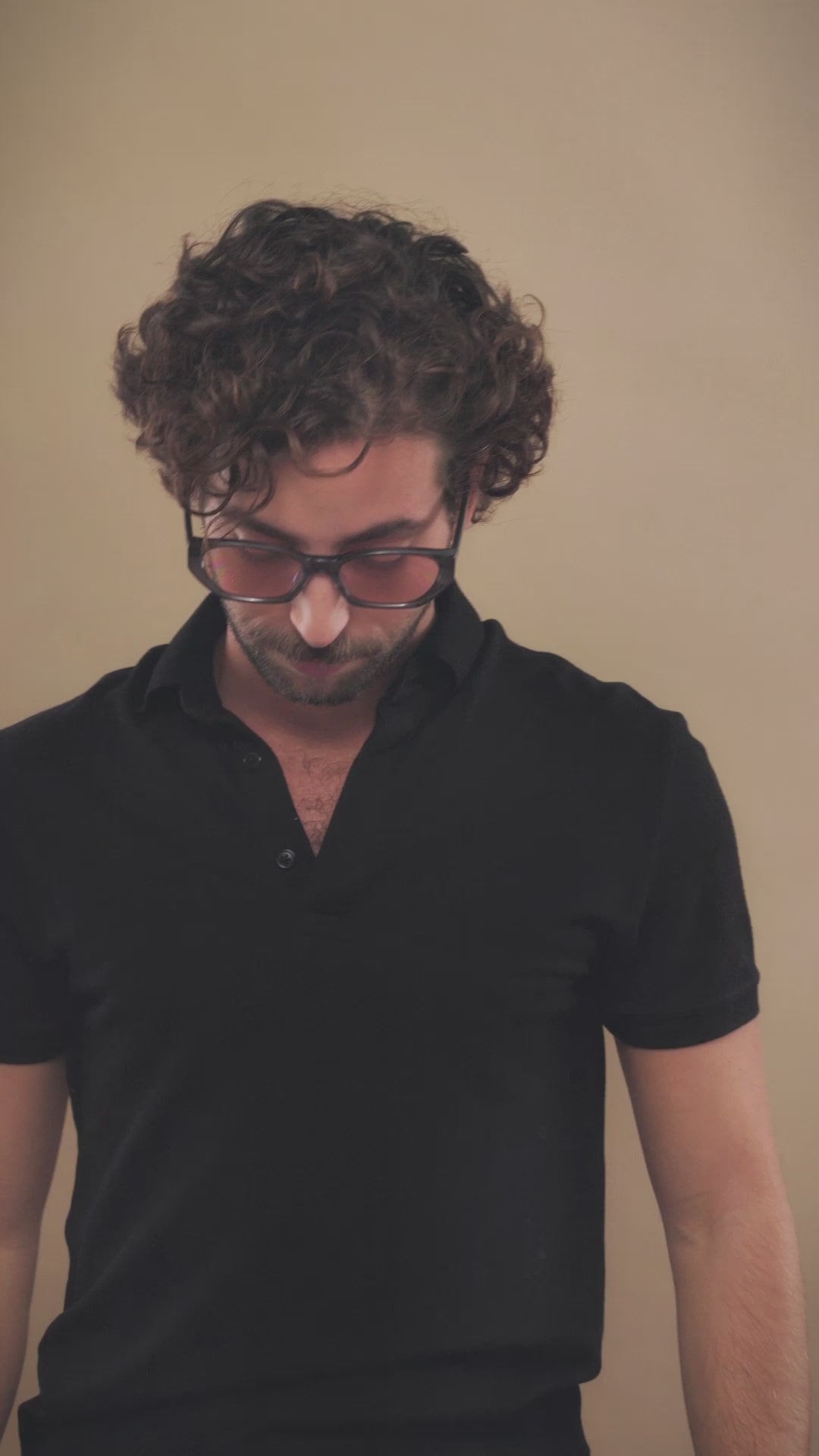 Lifestyle video of a male model wearing Mirach sunglasses in Transparent Gray. 