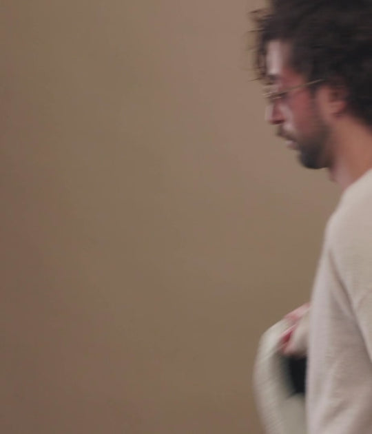 Lifestyle video of models wearing Sirius B sunglasses in Gold. 