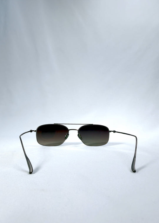Back view of Seren Arc sunglasses in Mocha Alloy, featuring mocha metal frame and rose-brown lenses, showing the inside frame and open temples. 