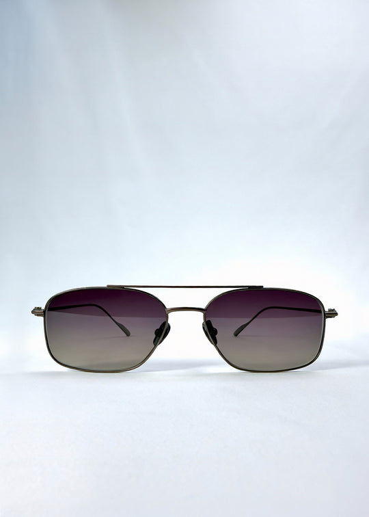 Front view of Seren Arc sunglasses in Mocha Alloy, featuring mocha metal frame and rose-brown lenses, showing the full front silhouette. 