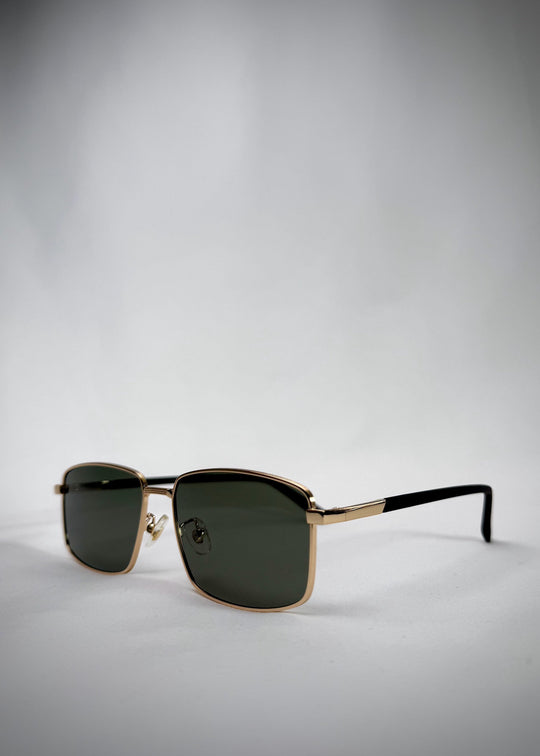 Angled view of Sirius A - Gold sunglasses, featuring adjustable nose pads and scratch-resistant polarized green lenses. 