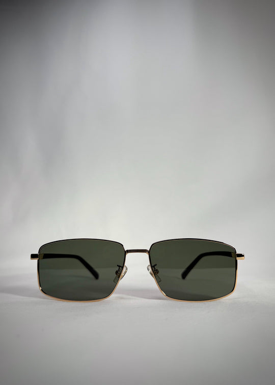 Front view of Sirius A - Gold stainless steel sunglasses with polarized green lenses – a perfect blend of classic luxury and modern precision. 