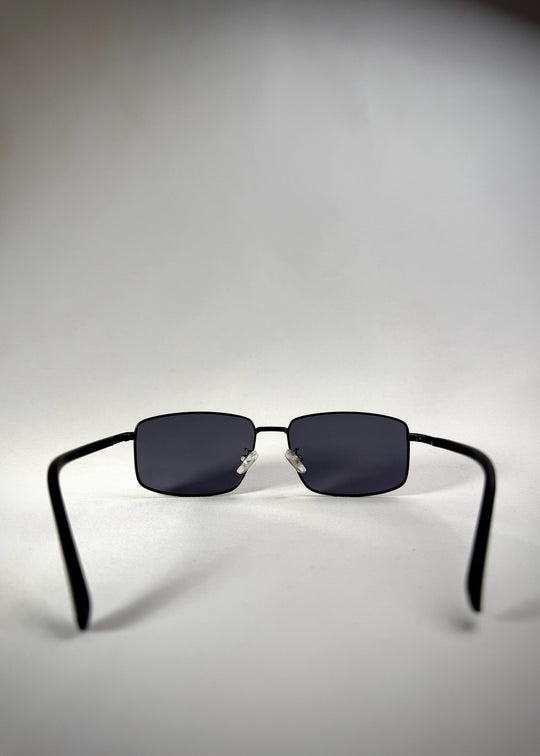 Back view of Sirius A - Semi-Matte Black stainless steel sunglasses, showcasing the adjustable nose pads and ergonomic temple design for a comfortable fit. 