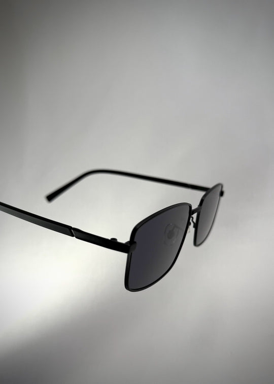 Close-up detail of Sirius A - Semi-Matte Black sunglasses, highlighting the beautiful steel arms and precision craftsmanship. 