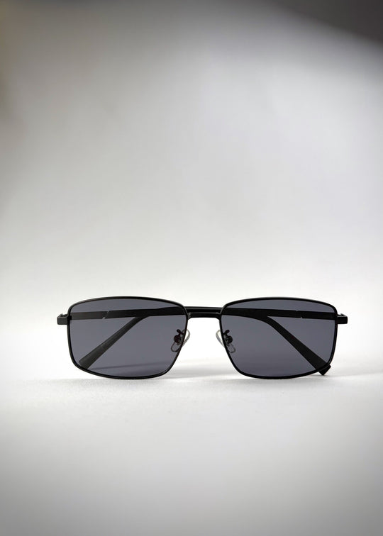 Folded view of Sirius A - Semi-Matte Black sunglasses, illustrating the compact and portable design. 