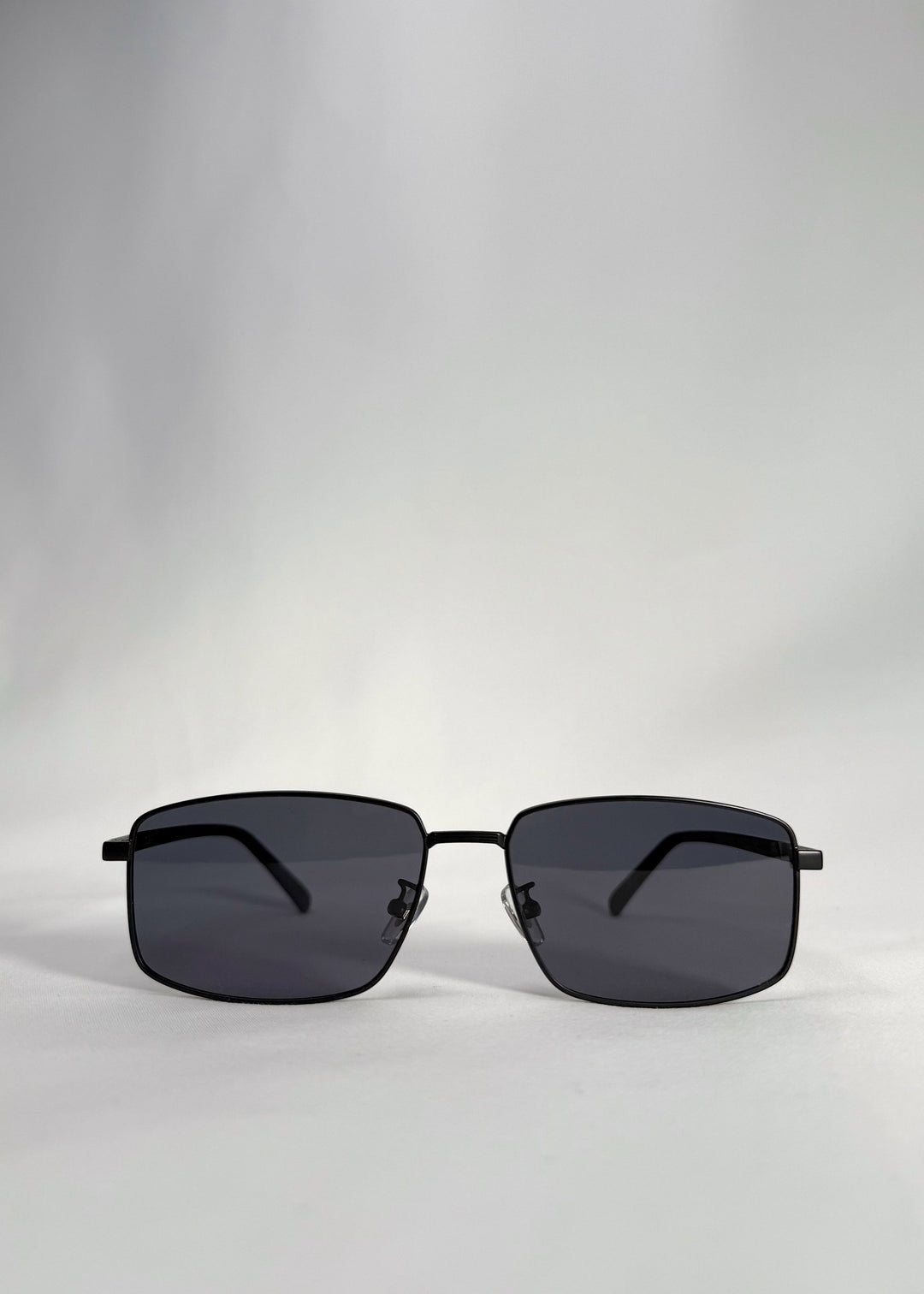 Front view of Sirius A sunglasses in Semi-Matte Black with a slim stainless-steel frame and polarized lenses. 