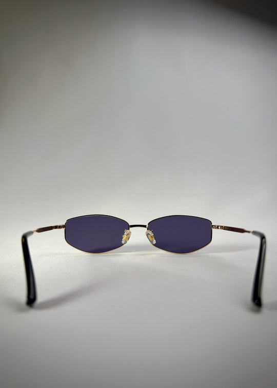 Back view of Sirius B gold stainless steel frame – Premium Prescription Sunglasses with blue-gray lenses for a sleek, modern style. 