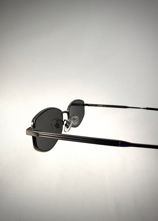 Second close-up of the temple and hinge detail on Sirius B sunglasses in Matte Black. 
