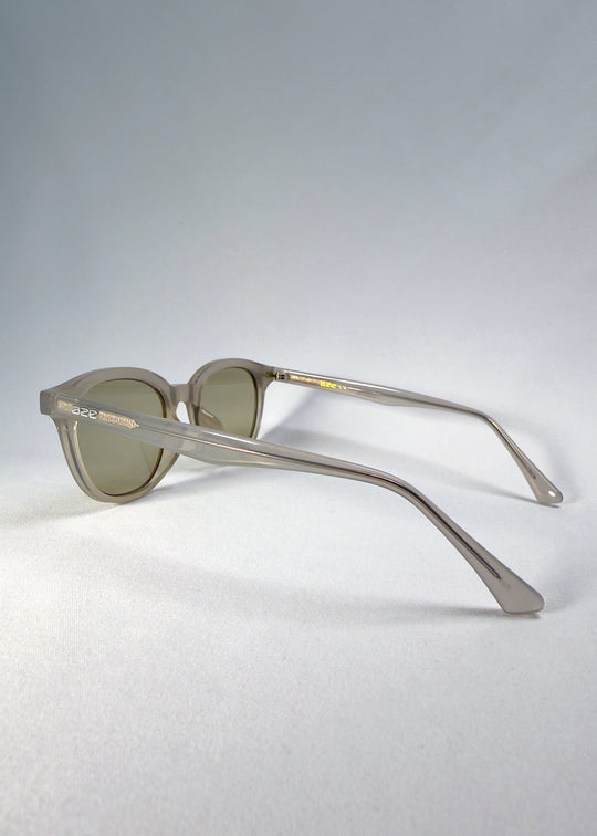 Side-temple view of Elvor sunglasses in Glacier Smoke. The frosted acetate arms flow smoothly for lightweight comfort. 
