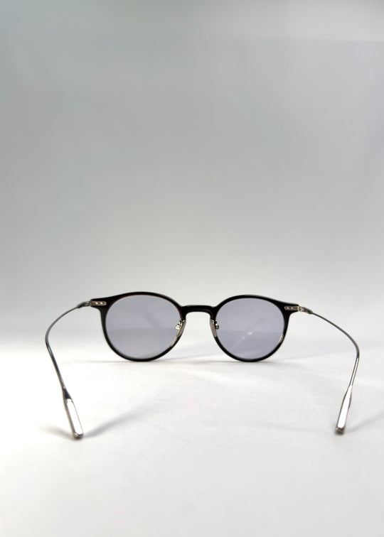 Back view of Lunor Drift Softint sunglasses in Onyx Fade displaying the hybrid acetate-titanium frame and lightweight structure. 