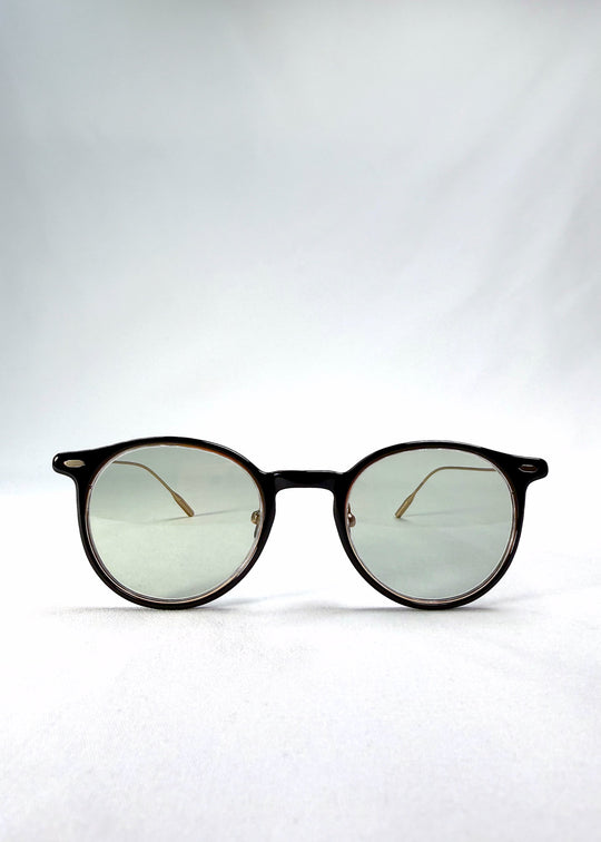 Front view of Lunor Drift Softint sunglasses in Shadow Gleam featuring round hybrid frame and softly tinted green-grey lenses. 