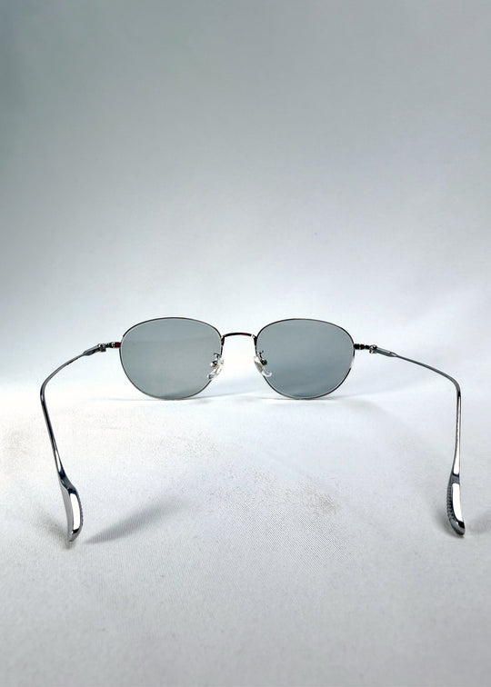 Inside view of Solen Softint sunglasses in Moonveil, showing the adjustable nose pads and open titanium temples. 