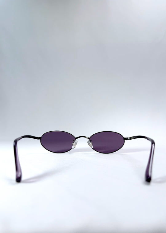Back view of Solstice – Gunmetal Frost sunglasses showing nose pads and open temple arms. 