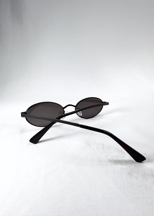 Back view of Solstice – Shadow Black, showing the curvature of the arms and adjustable nose pads. 