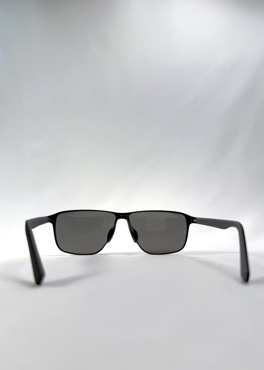 Back view of Vector Line sunglasses in Mercury Shadow, featuring wide black metal frame and silver mirrored polarized lenses, showing the inside frame and open temples. 