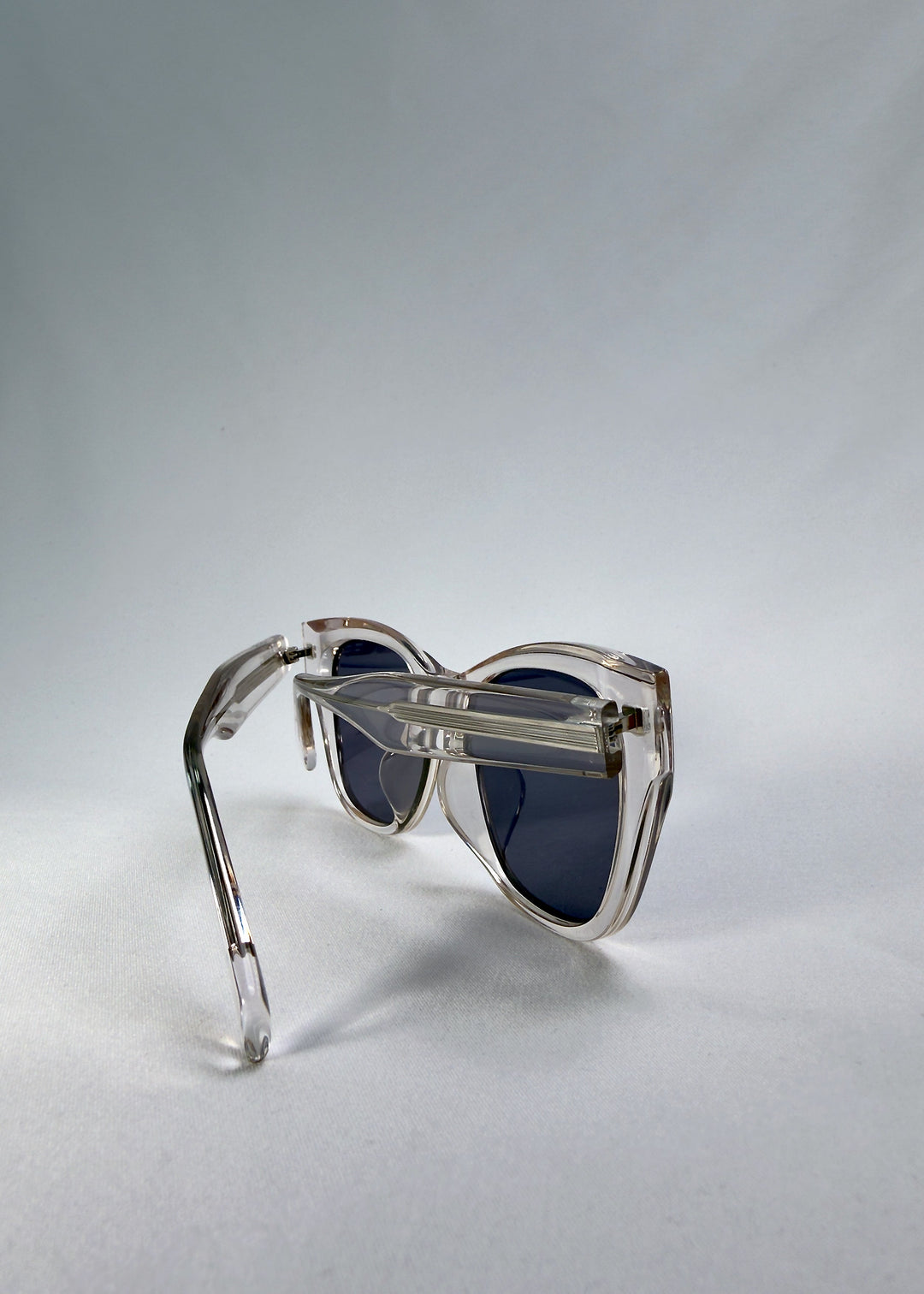 Back view of Veyron in Crystal Static, showing the inner temple details and clear acetate construction. 