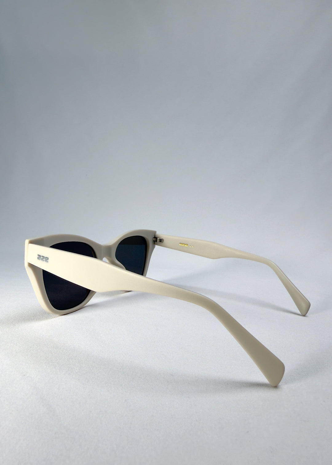 Right side-temple view of Veyron Pale Mirage sunglasses showing sculpted arms and smooth matte texture.