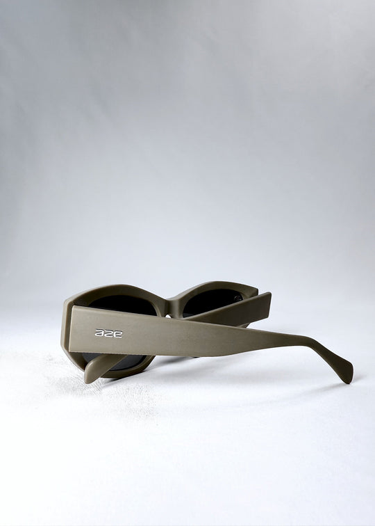 Folded back view of Void Striker Bronze Mirage sunglasses showcasing minimalist rear profile. 