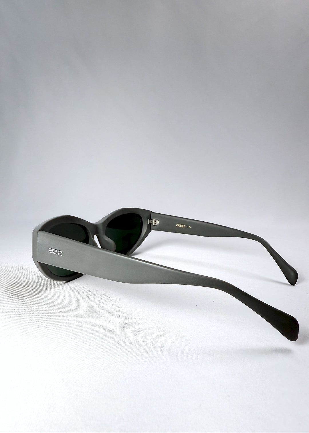 Side profile of the Void Striker sunglasses showing the smooth matte acetate temples and low-profile hinge. 