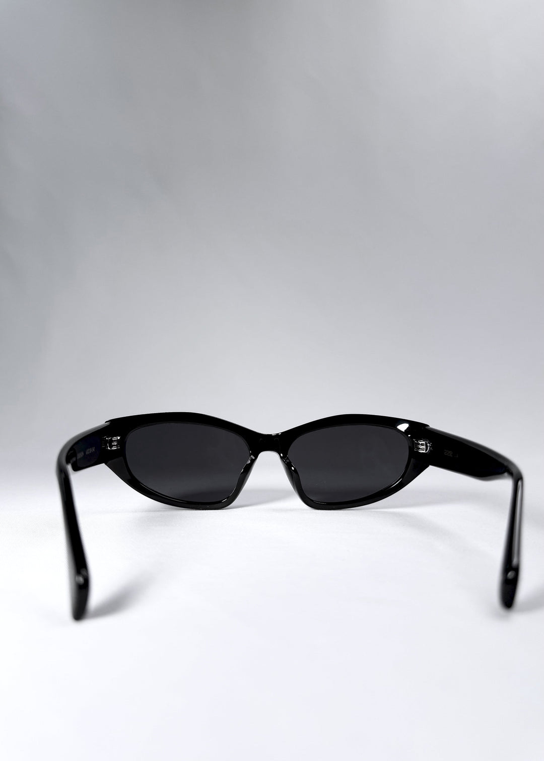 Back view of Void Striker showing curved temple arms and lens coverage for medium face sizes. 