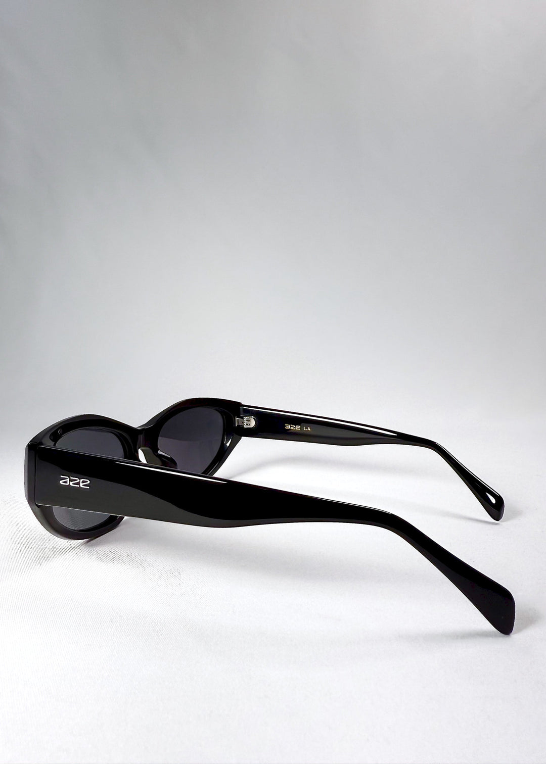 Side view of Void Striker sunglasses highlighting thick black temples and subtle Aze logo. 