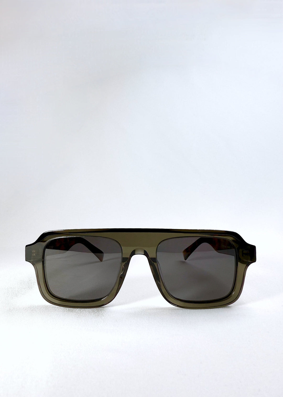Front view of Vortex Edge - Ash Tortoise, featuring a translucent grey rectangular frame with dark polarized lenses. 