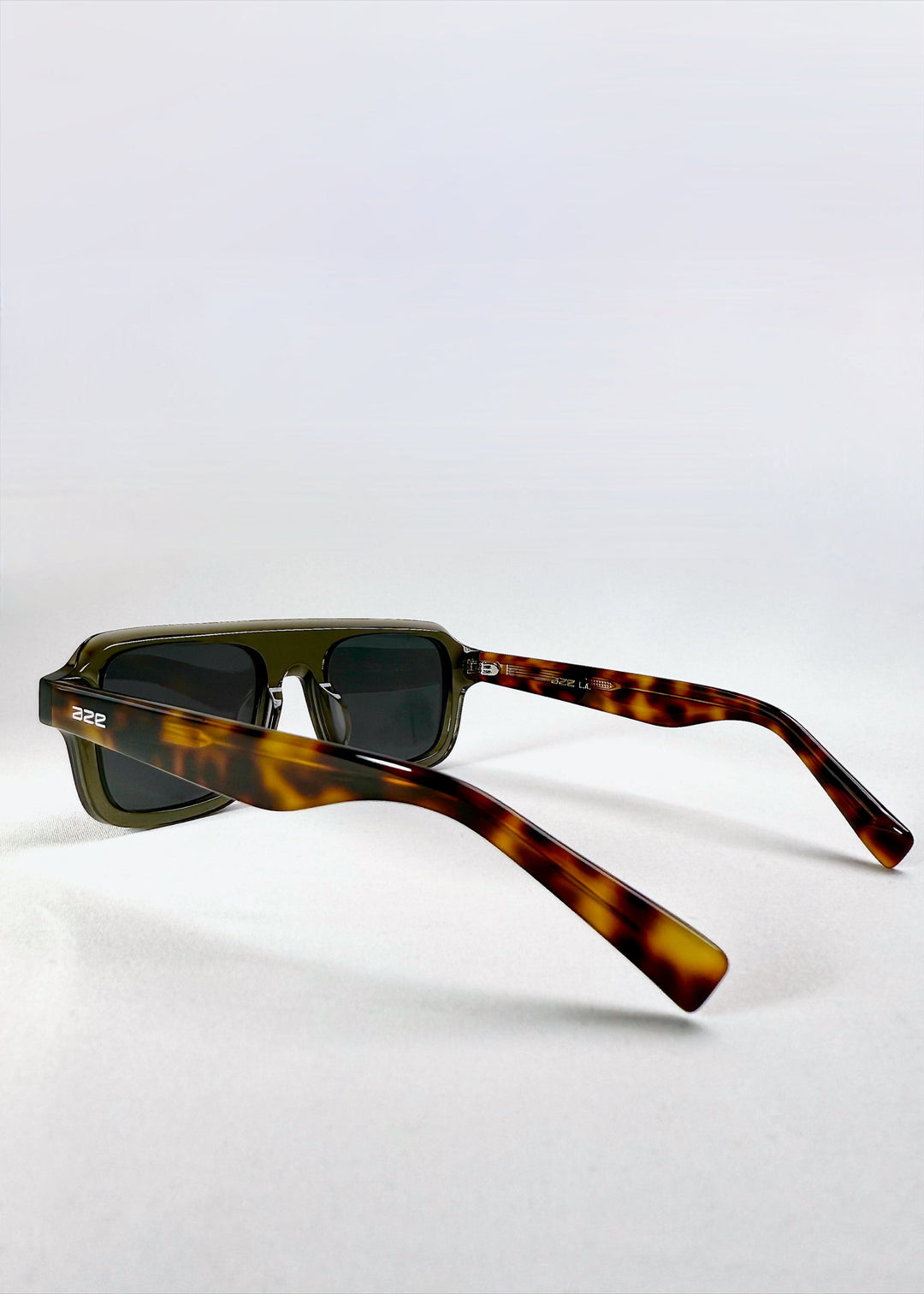 Side view of Vortex Edge in Ash Tortoise, highlighting the patterned acetate temples and modern silhouette. 