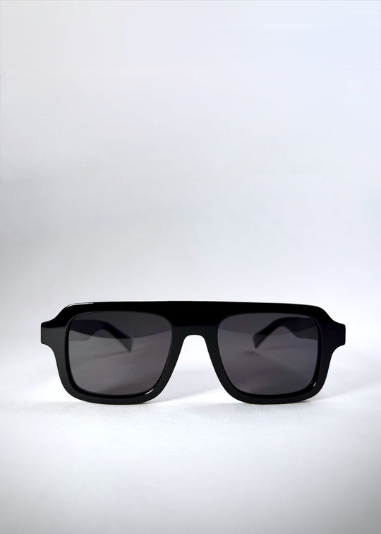 Front view of Vortex Edge sunglasses in Obsidian Black, highlighting the bold boxy silhouette. 