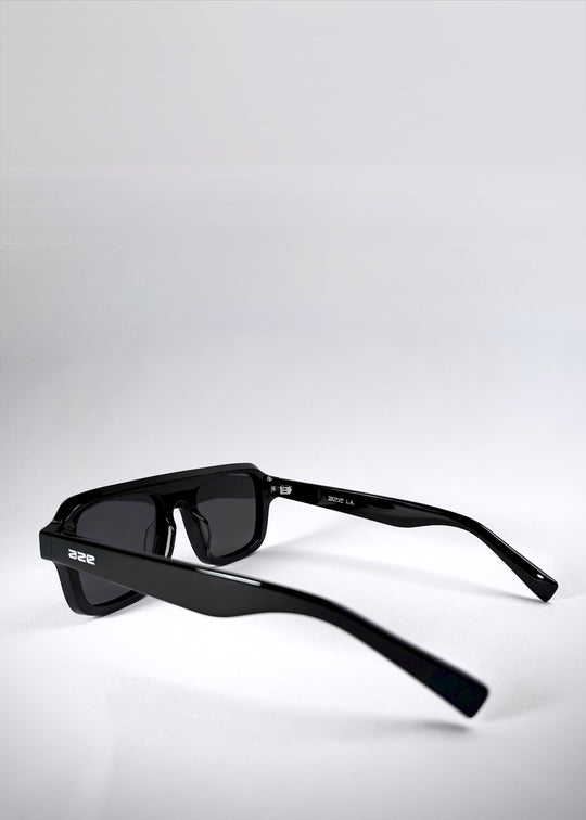 Side view of Vortex Edge sunglasses in Obsidian Black, featuring thick acetate arms with Aze branding. 