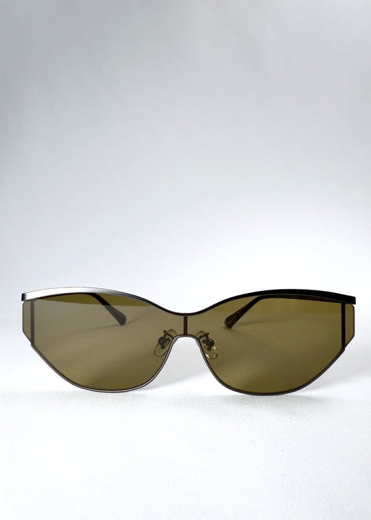 Front view of Zenith sunglasses in Olive Smoke, showing the semi-rimless shield silhouette and olive-tinted HD nylon lenses. 