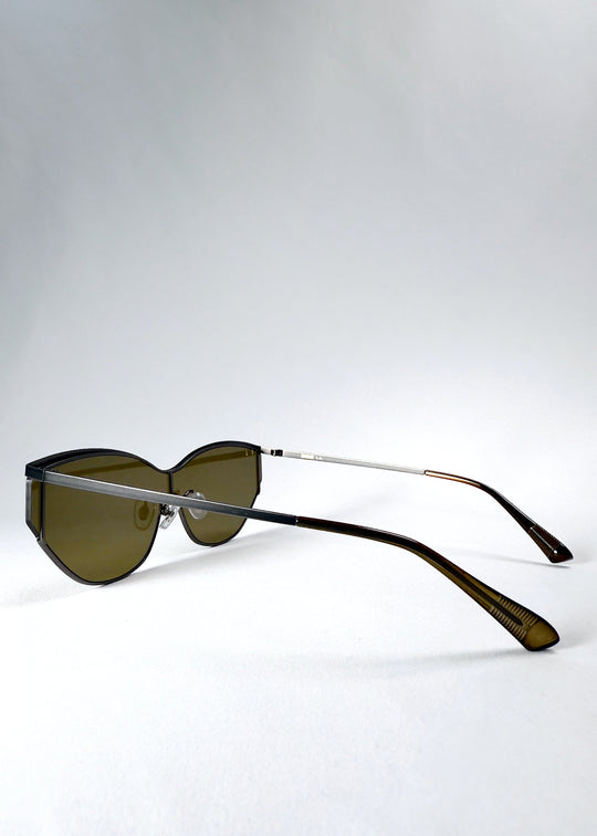 Side view of Zenith sunglasses in Olive Smoke, showing the slim stainless-steel temples and olive temple tips. 
